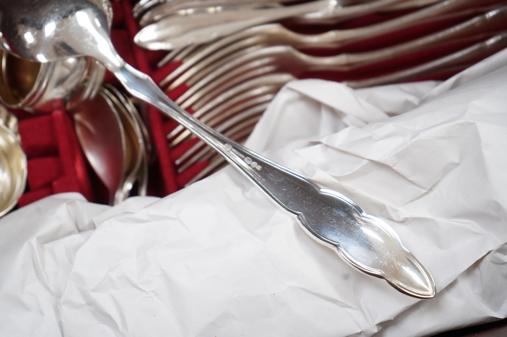 An oak cased, near complete, comprehensive canteen of plated cutlery together with odd cutlery from other sets.
